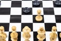 Above view of pawn and checkers piece move closeup Royalty Free Stock Photo