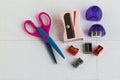 School supplies, scissors, pencil, shaving, on checkered paper Royalty Free Stock Photo