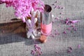 Above view of shiny cosmetics jars on makeup fashion desk