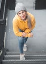 Above view of smiling full length beautiful young woman standing. Outdoors daylight. Pretty smile girl wearing casual clothing Royalty Free Stock Photo