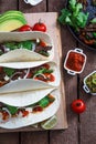 Above view of wheat wraps with mexican pork fajitas, selective focus Royalty Free Stock Photo