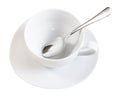 Above view of white cup with spoon on saucer Royalty Free Stock Photo