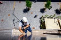 Industrial climber is washing, cleaning facade of a modern office building Royalty Free Stock Photo