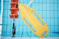 Above, water and a buoy in a pool for a lifeguard, life saving and safety. Board, summer and equipment for protection Royalty Free Stock Photo