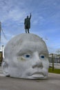 Above water, statue of Henk Hofstra in Lelystad