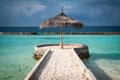 Above the water on the white sands and turquoise waters of teh Maldives Royalty Free Stock Photo