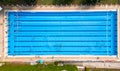 From above, you can see a group of swimmers training in a sports pool.