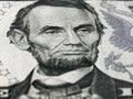 Abraham Lincoln portrait macro on 5 dollars money usa american banknote Royalty Free Stock Photo