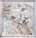 Abraham Sacrificing Isaac, relief on portal of Saint Petronius Basilica in Bologna Royalty Free Stock Photo