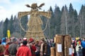 Abramtsevo, Moscow region, Russia, March, 13. 2016. People taking part in celebration of Bakshevskaya Shrovetide near straw effigy