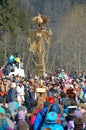 Abramtsevo, Moscow region, Russia, March, 13. 2016. People taking part in celebration of Bakshevskaya Shrovetide near straw effigy