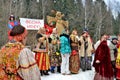 Abramtsevo, Moscow region, Russia, March, 13. 2016. People taking part in celebration of Bakshevskaya Shrovetide near straw effigy