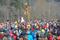Abramtsevo, Moscow region, Russia, March, 13. 2016. People taking part in celebration of Bakshevskaya Shrovetide near straw effigy