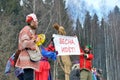 Abramtsevo, Russia, March, 13. 2016. People taking part in celebration of Bakshevskaya Shrovetide near straw effigy