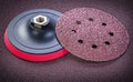 Abrasive discs holder on sandpaper sheet top view Royalty Free Stock Photo