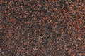 Abrasive texture roofing material close-up.