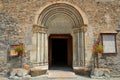 The main entrance of Saint Pierre and Saint Antoine church, with carvings, columns and two lions statues, located in Abries Royalty Free Stock Photo