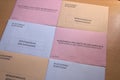Electoral envelopes arranged on a table