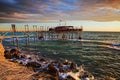 Rocca San Giovanni, Chieti, Abruzzo, Italy: landscape of the Adriatic sea coast at dawn with an ancient fishing hut trabocco Royalty Free Stock Photo