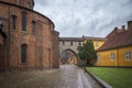 The Absalon Arch between bishop\'s palace and Gothic Roskilde Cathedral. Denmark Royalty Free Stock Photo