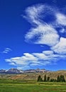 Absaroka Mountain Range under summer cirrus and lenticular clouds near Dubois Wyoming Royalty Free Stock Photo