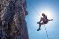 Abseiling woman Royalty Free Stock Photo