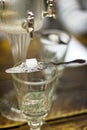 Absinth glass and fountain Royalty Free Stock Photo