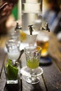 Absinth glass and fountain Royalty Free Stock Photo