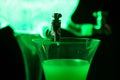 Absinth glass and fountain in green Royalty Free Stock Photo