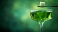 Absinthe cocktail with a sugar cube and spoon over the glass. Royalty Free Stock Photo