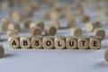 Absolute - cube with letters, sign with wooden cubes