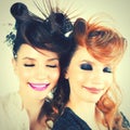 Absolutely Gorgeous Twins Girls with Fashion Make-up and Hairstyle Royalty Free Stock Photo