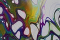 Abstract acrylic pour painting in bright swirling colors on white for backgrounds. Royalty Free Stock Photo