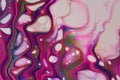 Fuschia dominates this multicolored abstract acrylic pour painting for backgrounds. Royalty Free Stock Photo