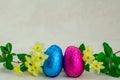 Colorful Easter chocolate eggs and flowers Royalty Free Stock Photo