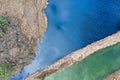 Abstract Aerial view of a lake in the German heath landscape, Vertical photo above the middle of the moor lake