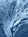 Abstract aerial view of a tideway in a beach, blue toned Royalty Free Stock Photo