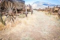 Abstract of Antique Wood Wagons and Weathered Old Wagon Wheels. Royalty Free Stock Photo