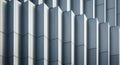 Abstract architectural detail of a modern building facade with repeating geometric patterns and shadows Royalty Free Stock Photo