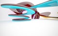 Abstract architectural interior with colored smooth glass sculpture with brown lines. Royalty Free Stock Photo