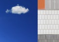 Abstract architecture background against a blue sky with one cloud. Concept and empty copy space Royalty Free Stock Photo