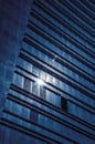 Abstract architecture background of modern building blue glazed facade with metal panels Royalty Free Stock Photo