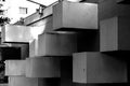 Abstract architecture made of concrete with square blocks sticking out of the wall Royalty Free Stock Photo