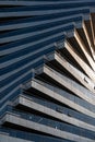 Abstract architecture, modern glass building. Close up view of a spiral modern office building at dusk Royalty Free Stock Photo