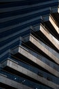 Abstract architecture, modern glass building. Close up view of a spiral modern office building at dusk Royalty Free Stock Photo