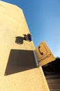 Abstract architecture photograph of Emergency sign with shadow.