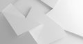 Abstract arrangement of overlapping white paper sheets creates a geometric