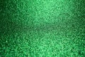 Abstract art background of sparkling bright green color glitter texture