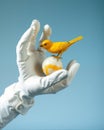 Abstract art composition with assemblage of white leather gloves and yellow bird Royalty Free Stock Photo