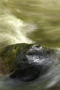 Abstract art of motion blur water surface on the rock natural color painting and design